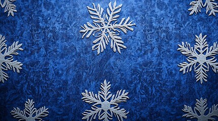 White snowflakes on textured blue backdrop. Holiday decor, greeting cards, winter themes, and abstract art
