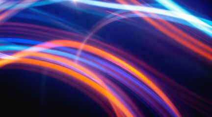 Obraz premium Abstract neon light motion with vibrant blue and orange electric waves. Futuristic digital curved energy streams luminous swirls against dark background. Dynamic flowing beams with glowing trails