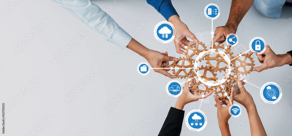 Leinwandbilder Hands gather around gears representing collaboration in computing, featuring digital icons that symbolize connectivity and innovation in technology-driven environments. Amity