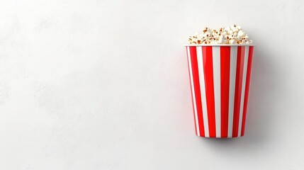 Popcorn bucket background with bright red-and-white striped container