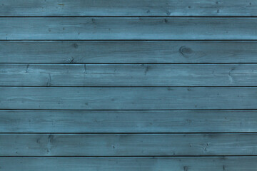 Naklejka premium texture of wooden planks painted blue color
