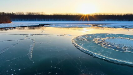 Stunning frozen lake at sunrise with floating ice discs in winter. concept of natural beauty, tranquility, ice formations - Powered by Adobe