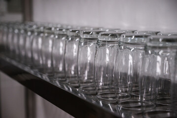 Wine glasses hanging from the shelves
