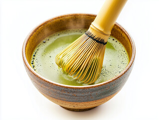 Traditional Japanese Matcha Tea Preparation with Bamboo Whisk. A steaming bowl of ceremonial-grade matcha tea being whisked with a traditional bamboo chasen. 