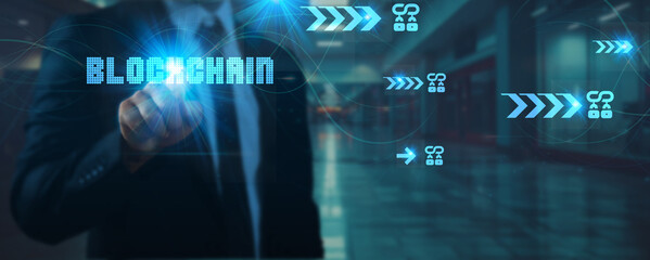 Businessman touches a technology point in hand network connection on blockchain technology, decentralized systems, digital security, smart contracts, innovation, and futuristic solutions