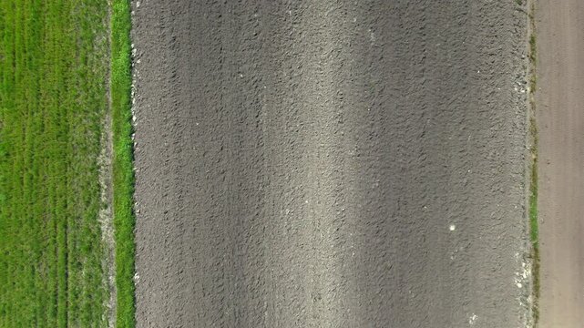 Aerial View of a Freshly Plowed Agricultural Field with Soil Texture