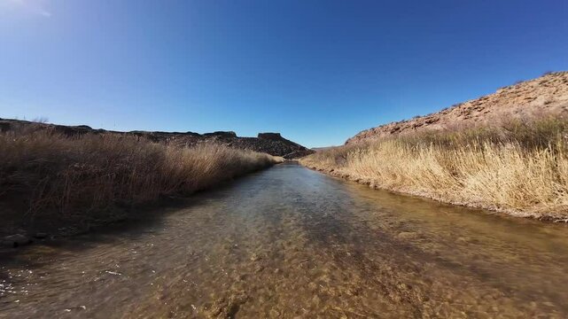 Virgin River - Hurricane, Utah, USA - February 10, 2025: Aerial-FPV-Flying fast over seasonally shallow Virgin River 