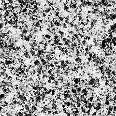 Black and white paint splatter texture with abstract grunge motif background