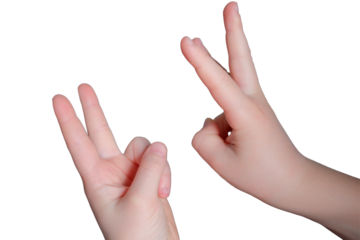 Hands forming peace sign and victory gesture in bright setting