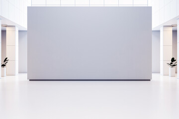 Modern exhibition space with blank wall for mockup. 3D Rendering