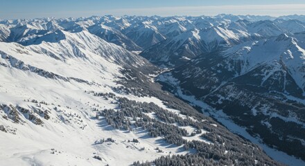 Aerial drone over beautiful mountains in austria cold snow winter landscape