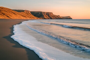 A beautiful coastal landscape featuring a beach and ocean waves