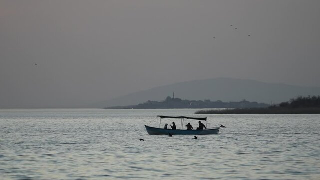 fishermen on the lake