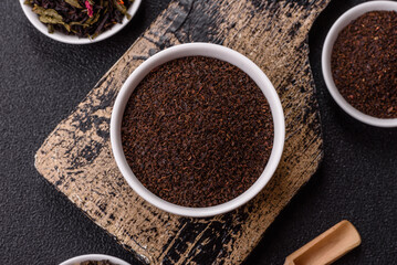 Black tea dry crushed in bowl