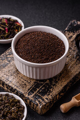 Black tea dry crushed in bowl