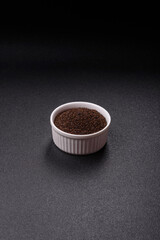 Black tea dry crushed in bowl