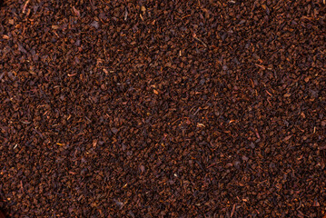 Black tea dry crushed in bowl