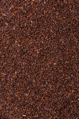 Black tea dry crushed in bowl