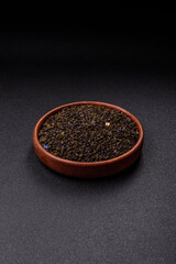 Dry green tea with soursop piece, knapweed petals in bowl