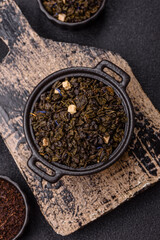 Dry green tea with soursop piece, knapweed petals in bowl