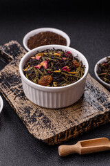 Dry tea mix blend black, green and flower petals in bowl