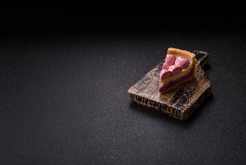 Sweet cheesecake with berry flavor, decorated with pink hearts