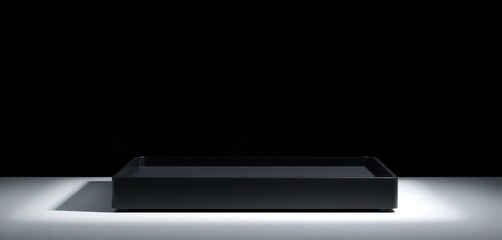 Obraz premium Sleek black box, lid closed, ample empty space for product display, business, exclusive