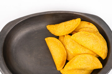 Delicious traditional Colombian empanadas with spicy sauce