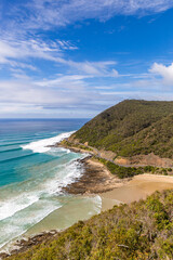 Stunning cliffs and rolling waves define this iconic landscape along the Great Ocean Road, showcasing nature’s beauty at Lorne in Victoria, Australia