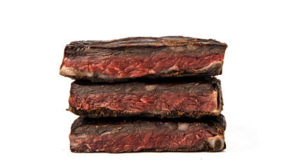Three pieces of meat stacked on top of each other. The meat is brown and has a lot of fat