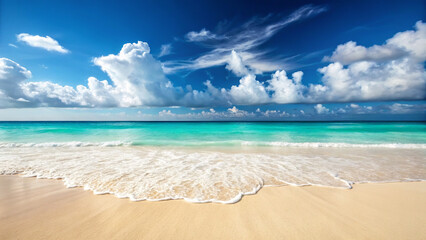 Azure Beach and White Waves with Sandy Shoreline with Fluffy Clouds Against a Blue Sky