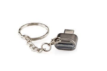 Silver USB type-C card reader isolated on white background.