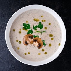 Delicious cream soup with mushrooms