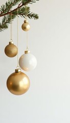Elegant gold Christmas ornaments hanging against a pure white background , star, holiday