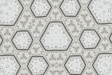 Abstract geometric hexagonal pattern in grayscale tones The intricate symmetrical design creates a...