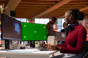 Developer uses isolated screen PC in AI tech agency providing software development services. Startup IT specialist uses artificial intelligence to streamline coding process on chroma key computer