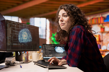 System administrator in startup office coding advanced AI algorithm and machine learning models...