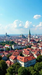 Fototapeta premium A panoramic cityscape of Belgrade, Serbia with a blend of historic and modern architecture under a blue sky, panorama, city view