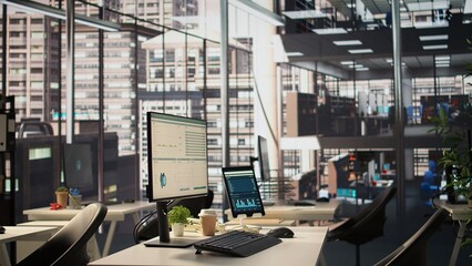 Empty business workplace equipped with modern tech tools to serve an enterprise, workspace in a high end city center corporation. Global organization luxurious corporate culture.