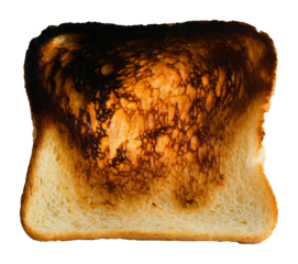 Slice of burnt toast with crispy texture and golden brown edges. Cooking mishap concept