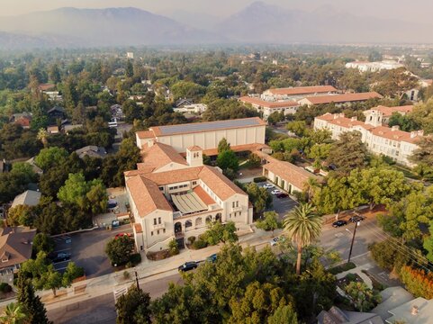 Aerial view of Claremont United Church of Christ, a progressive congregation in Claremont, California, USA. The church is surrounded by trees and other buildings.