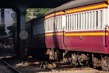 Thai railway train with locomotive runs in Bangkok