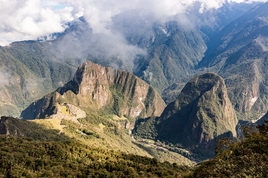 Aerial view of Machu Picchu ruins and Urubamba river valley from Machu Picchu mountain, Peru