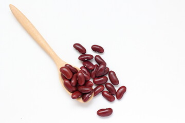 Fototapeta premium Red beans and spoon on white background 