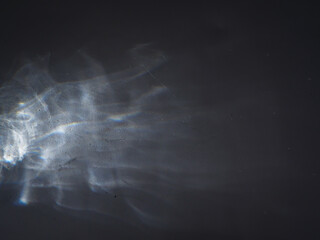 Reflection in the dark for an energy or abstract mystery background.   