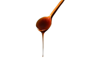 honey dripping from spoon