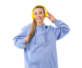 Stylish young woman in lilac hoodie with headphones on white background