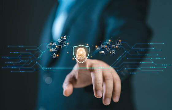 Cybersecurity and privacy concepts to protect data. Business Finger press on the fingerprint icon and internet network security technology. Virtual screen interfaces. cyber security. - Powered by Adobe