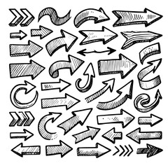 Set of black hand drawn arrows in multiple shapes