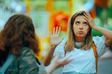 Woman Tired of Fighting Asking her Friend to Stop. People in an argument looking for reconciliation...